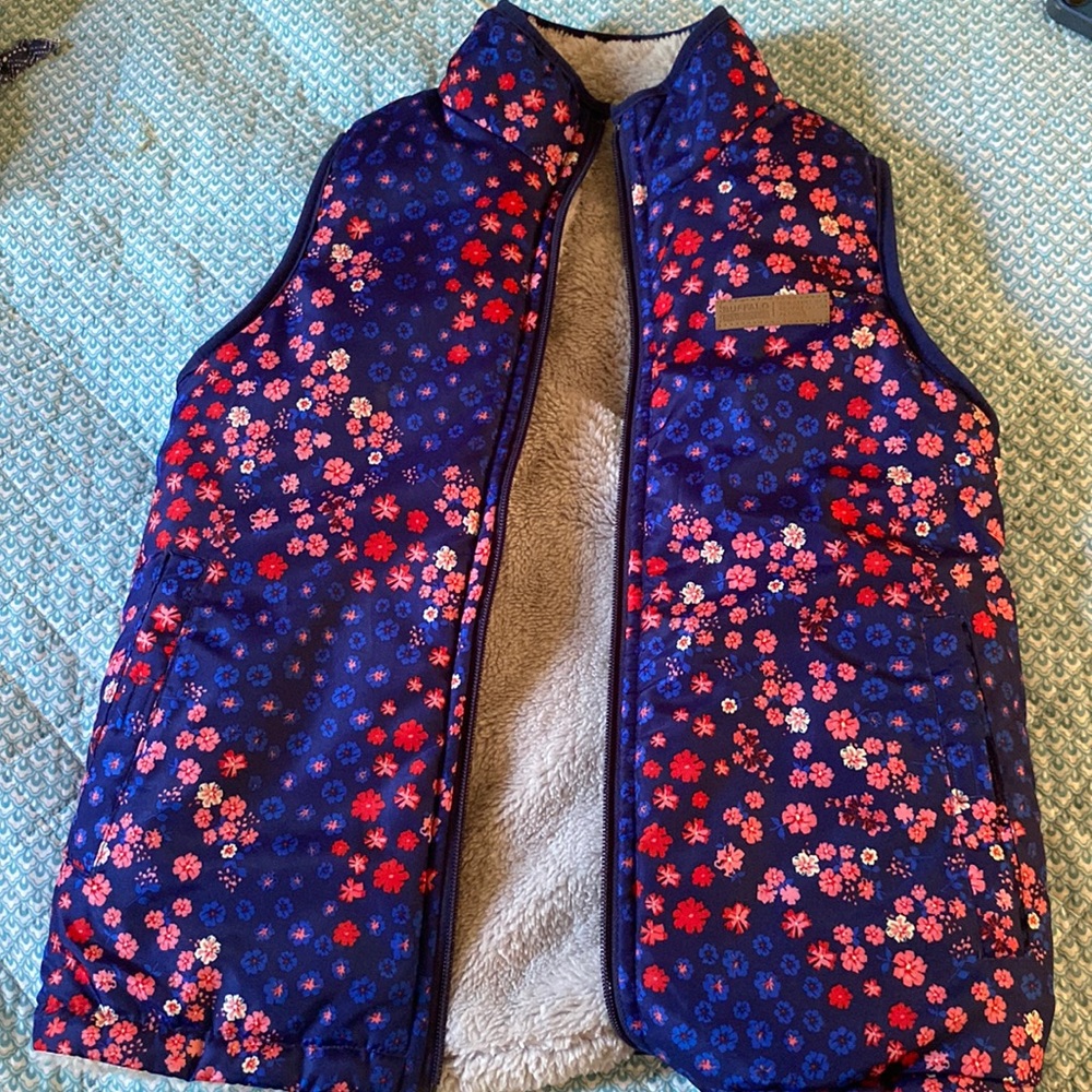This is a flower vest with very fluffy insole